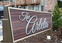The Arleta logo sign
