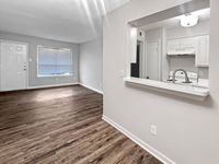 Dining meets comfort in one space Memorial Fountain Apartment Kitchen and Living Room | Apartments in Houston, TX