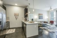 houston heights apartments | apartments on washington ave |Azure Houston Apartment Kitchen and Living Room | Essential Housing Apartment | Houston, TX Apartment