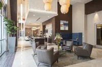 A sleek space to relax or socialize. Pearl Residences at City Centre Clubhouse | Houston, TX Apartments | Houston CityCentre Apartments