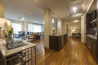 Where city living meets gourmet style. Pearl Residences at City Centre Apartment Kitchen and Living Room | Houston, TX Apartments | Houston CityCentre Apartments