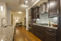 A perfect fusion of design and functionality. Pearl Residences at City Centre Apartment Kitchen | Houston, TX Apartments | Houston CityCentre Apartments