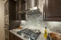 Space-saving stove for urban kitchens Pearl Residences at City Centre Apartment Gas Range | Houston, TX Apartments | Houston CityCentre Apartments