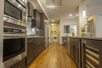 Clean lines and modern finishes for inspired cooking. Pearl Residences at City Centre Apartment Kitchen | Houston, TX Apartments | Houston CityCentre Apartments