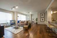 Bright and airy space designed for relaxation Pearl Residences at City Centre Apartment Living Room | Houston, TX Apartments | Houston CityCentre Apartments
