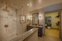 Functional luxury in one connected space Pearl Residences at City Centre Apartment Bathroom and Closet | Houston, TX Apartments | Houston CityCentre Apartments