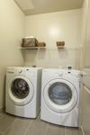 Functional and organized Pearl Residences at City Centre Apartment Laundry | Houston, TX Apartments | Houston CityCentre Apartments