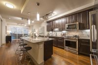 Natural light enhances every corner. Pearl Residences at City Centre Apartment Kitchen | Houston, TX Apartments | Houston CityCentre Apartments