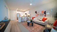Connected spaces for everyday living Altura at the Groves Living Room and Kitchen | Whittier, CA Apartments | Apartments in Whittier