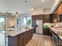 Seamless layout with functional style. The McCarthy at Memorial City Kitchen | Houston, TX Apartments | Apartments in Houston, TX