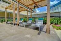 Relax and unwind by the water. The McCarthy at Memorial City pool | Houston, TX Apartments | Apartments in Houston, TX