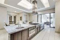 Ideal for cooking and gathering. The McCarthy at Memorial City Clubhouse Kitchen | Houston, TX Apartments | Apartments in Houston, TX