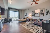 Spacious area with natural light. The McCarthy at Memorial City Living Room | Houston, TX Apartments | Apartments in Houston, TX