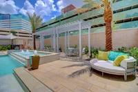 Cozy and inviting poolside arrangement. The McCarthy at Memorial City | Houston, TX Apartments | Apartments in Houston, TX