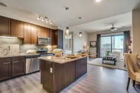Sleek kitchen with contemporary finishes. The McCarthy at Memorial City | Houston, TX Apartments | Apartments in Houston, TX