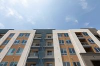 Spacious grounds surrounding the apartment exteriors.