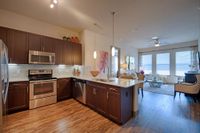 Pearl Woodlake Kitchen and Living | Houston, TX Apartments | 1-3 Bedroom Apartments in Houston