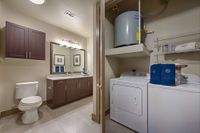 Pearl Woodlake Laundry and Bathroom | Houston, TX Apartments | 1-3 Bedroom Apartments in Houston