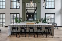Elegant open kitchen space with a luxurious marble island