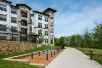 Caroline Florence | Apartments in McKinney Texas | Creekside walking trail accessible from the apartment community