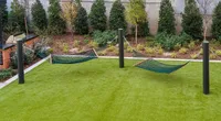 Hang Out in our Hammocks Peaceful Hammocks on lush green courtyard | Apartments for rent in Plano, TX | The Emory