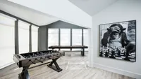 Resident Lounge with Foosball and Shuffleboard at Autumn Columbia apartments.