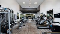 Redesigned Fitness Center with cardio equipment, free weights and machines at Autumn Columbia apartments.