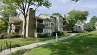 Beautifully Landscaped Walking Paths Around Homes at Alister Galleria apartments.