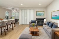 Updated, Open Layout with Kitchen and Separate Dining Area featuring wood plank flooring and bright finishes in an Autumn Columbia apartment.