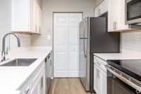 State-of-the-Art Kitchen with Large Farmhouse Sink at Autumn Town Center Columbia apartments.