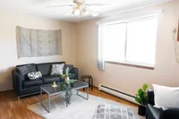 Light Infused  Living Area | Campus View & Kirkwood Court | Cedar Rapids, Iowa