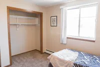 Roomy Bedroom | Campus View & Kirkwood Court | Cedar Rapids, Iowa