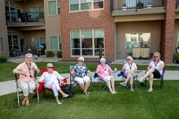 Residents Enjoying Outdoor Seating | Attivo Trails Waukee | Waukee, Iowa