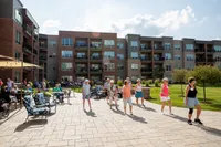Residents having a BBQ Picnic | Attivo Trails Waukee | Waukee, Iowa