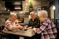 Residents Playing Cards | Attivo Trails Waukee | Waukee, Iowa