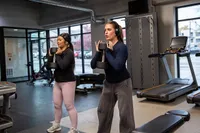 Residents in Fitness Center | 2700 Lincoln in Ames