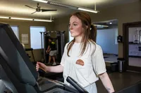 Resident in Fitness Center | Reserve at Kirkwood, Cedar Rapids, IA