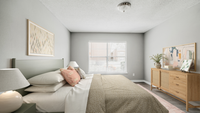 Bedroom with wooden dresser, queen-size bed, large center window, table lamp