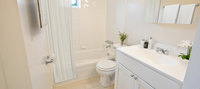 Bright bathroom interior with full-size tub and stylish finishes at Valley High Apartments in Roxborough