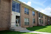 Front view of Woodmere Apartments