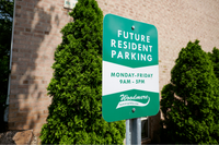 Sign for prospective residents at Woodmere Apartments in Roxborough