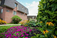 Well-maintained apartment complex with free parking and green space at Valley High in Roxborough