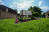 Lush landscaped grounds at Valley High Apartments, part of Summit Park Communities in Roxborough