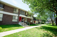 Community entrance and apartment buildings at Summit Park