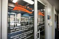 Inviting entrance to Summit Park Clubhouse gym, showcasing modern fitness facilities for residents.