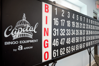 Classic bingo board with bold numbers and Capital Bingo Equipment branding.