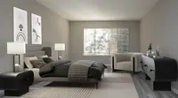 Elegant bedroom with modern decor, featuring a plush bed, stylish armchair, sleek nightstands, and large window for natural light.