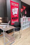 Amenity Suite including a printing station. Wisconsin Badgers