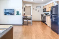 Updated Kitchen and Dining Area Open-plan updated kitchen and dining area.