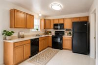 Contemporary kitchen with warm wood cabinets, sleek black appliances, and elegant decor in a bright, cozy space.